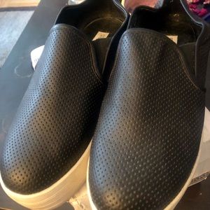 Black leather platform sneakers or slides